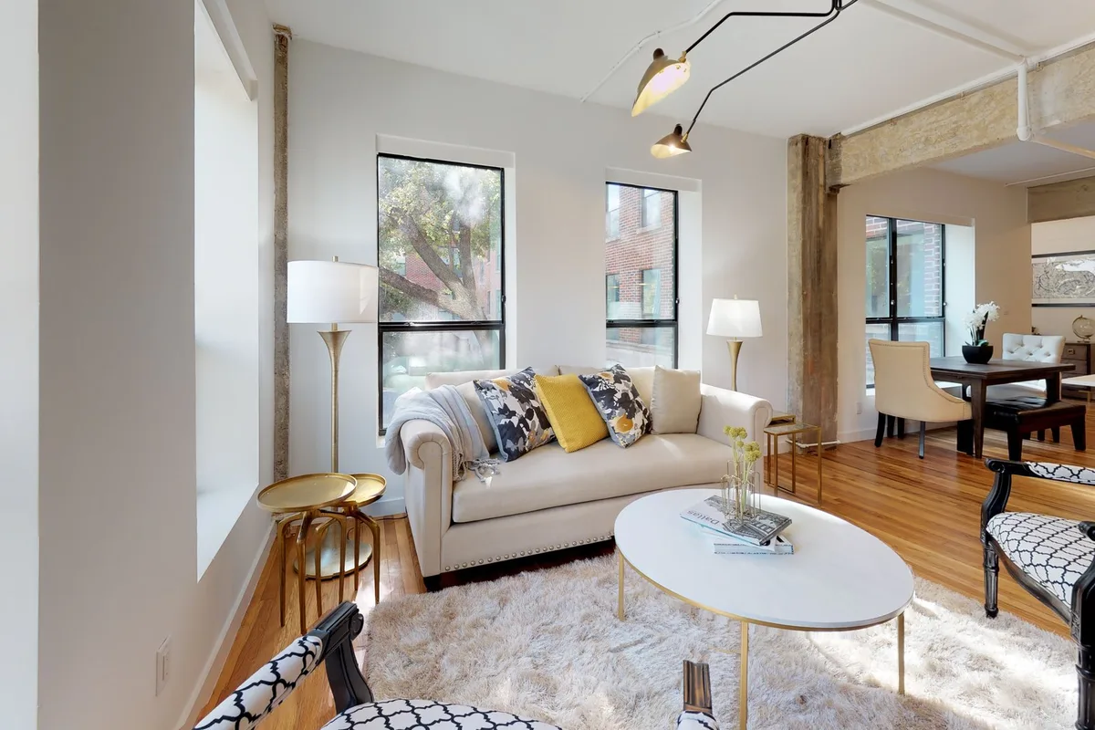 Living room in The Sinastra one-bedroom, from its 3D tour